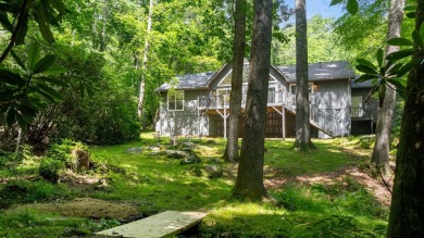 Located in the heart of Sapphire Valley, this well-maintained on Sapphire National Golf Club in North Carolina - for sale on GolfHomes.com, golf home, golf lot