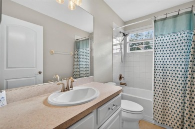 SCENIC. SPACIOUS. SERENEe visit this 4-bedroom, 2.5-bath home on on Meadow Oaks Golf and Country Club in Florida - for sale on GolfHomes.com, golf home, golf lot