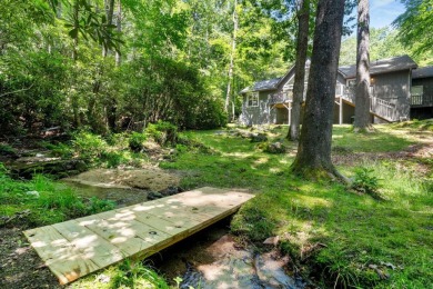 Located in the heart of Sapphire Valley, this well-maintained on Sapphire National Golf Club in North Carolina - for sale on GolfHomes.com, golf home, golf lot