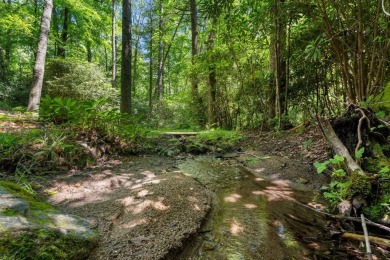 Located in the heart of Sapphire Valley, this well-maintained on Sapphire National Golf Club in North Carolina - for sale on GolfHomes.com, golf home, golf lot