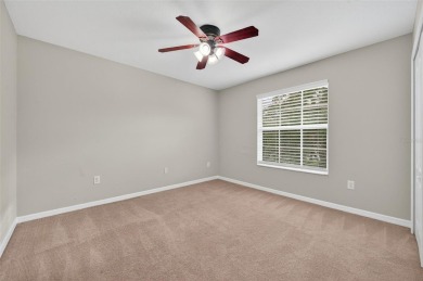 SCENIC. SPACIOUS. SERENEe visit this 4-bedroom, 2.5-bath home on on Meadow Oaks Golf and Country Club in Florida - for sale on GolfHomes.com, golf home, golf lot