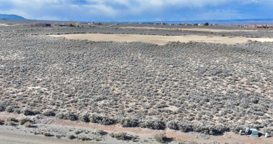 You have just found an amazing lot within the Taos Country Club on Taos Country Club in New Mexico - for sale on GolfHomes.com, golf home, golf lot