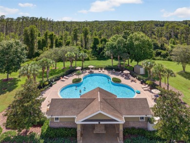 SCENIC. SPACIOUS. SERENEe visit this 4-bedroom, 2.5-bath home on on Meadow Oaks Golf and Country Club in Florida - for sale on GolfHomes.com, golf home, golf lot