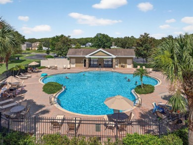 Under contract-accepting backup offers. SCENIC. SPACIOUS on Meadow Oaks Golf and Country Club in Florida - for sale on GolfHomes.com, golf home, golf lot