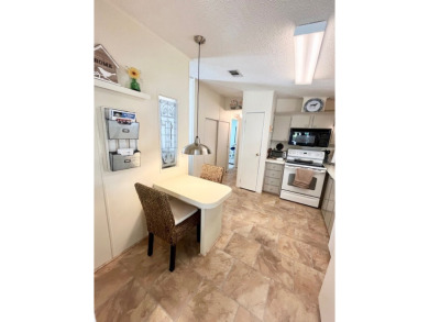 Welcome to your new home in Lake Fairways Country Club! This on Pine Lakes Country Club in Florida - for sale on GolfHomes.com, golf home, golf lot