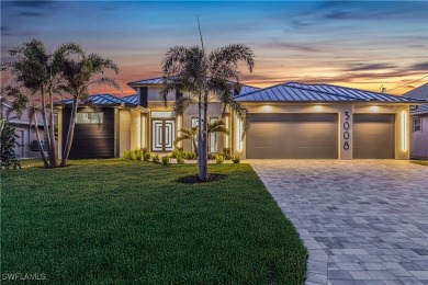 This stunning new construction home offers the perfect blend of on Royal Tee Country Club in Florida - for sale on GolfHomes.com, golf home, golf lot