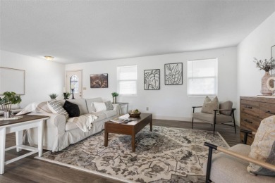 RELAX BY THE RIVER IN THIS MOVE-IN READY RETREAT ON REEF ROAD! on Daytona Beach Golf Club in Florida - for sale on GolfHomes.com, golf home, golf lot