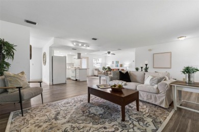 RELAX BY THE RIVER IN THIS MOVE-IN READY RETREAT ON REEF ROAD! on Daytona Beach Golf Club in Florida - for sale on GolfHomes.com, golf home, golf lot