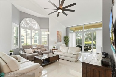 Very rarely available corner villa overlooking a canal and the on Palm-Aire Country Club and Resort - The Oaks in Florida - for sale on GolfHomes.com, golf home, golf lot