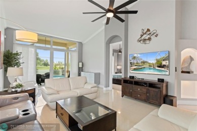 Very rarely available corner villa overlooking a canal and the on Palm-Aire Country Club and Resort - The Oaks in Florida - for sale on GolfHomes.com, golf home, golf lot