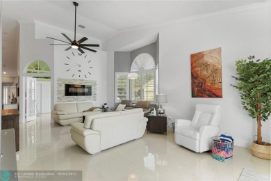 Very rarely available corner villa overlooking a canal and the on Palm-Aire Country Club and Resort - The Oaks in Florida - for sale on GolfHomes.com, golf home, golf lot