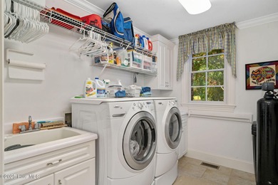 This custom-built home by renowned builder Johnny Stone offers on River Landing Golf Course in North Carolina - for sale on GolfHomes.com, golf home, golf lot