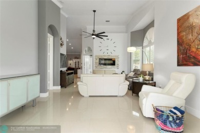 Very rarely available corner villa overlooking a canal and the on Palm-Aire Country Club and Resort - The Oaks in Florida - for sale on GolfHomes.com, golf home, golf lot