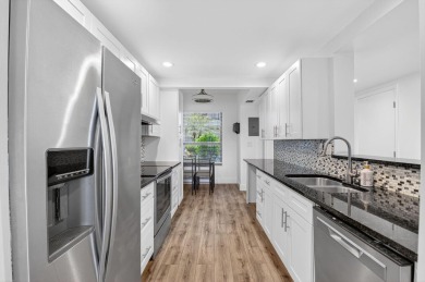 Delray's best kept secret! This beautiful and spacious condo is on Hamlet Country Club in Florida - for sale on GolfHomes.com, golf home, golf lot