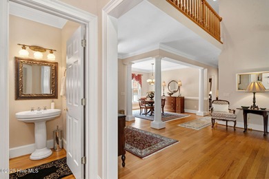 This custom-built home by renowned builder Johnny Stone offers on River Landing Golf Course in North Carolina - for sale on GolfHomes.com, golf home, golf lot