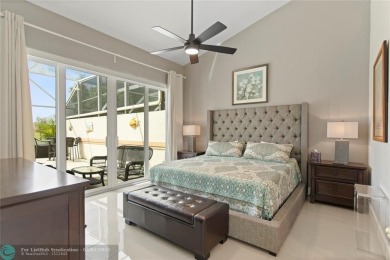 Very rarely available corner villa overlooking a canal and the on Palm-Aire Country Club and Resort - The Oaks in Florida - for sale on GolfHomes.com, golf home, golf lot