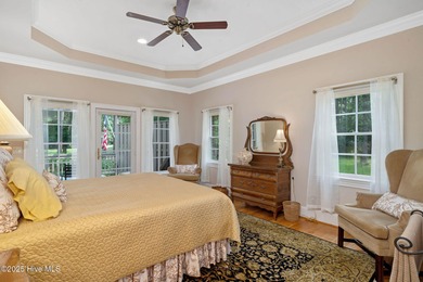 This custom-built home by renowned builder Johnny Stone offers on River Landing Golf Course in North Carolina - for sale on GolfHomes.com, golf home, golf lot