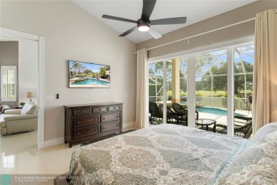 Very rarely available corner villa overlooking a canal and the on Palm-Aire Country Club and Resort - The Oaks in Florida - for sale on GolfHomes.com, golf home, golf lot