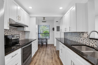 Delray's best kept secret! This beautiful and spacious condo is on Hamlet Country Club in Florida - for sale on GolfHomes.com, golf home, golf lot