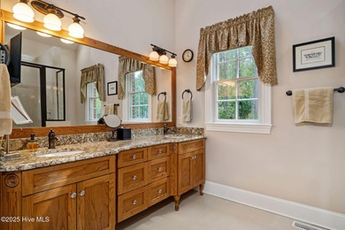 This custom-built home by renowned builder Johnny Stone offers on River Landing Golf Course in North Carolina - for sale on GolfHomes.com, golf home, golf lot