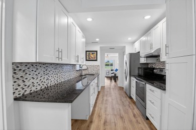 Delray's best kept secret! This beautiful and spacious condo is on Hamlet Country Club in Florida - for sale on GolfHomes.com, golf home, golf lot