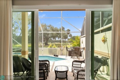 Very rarely available corner villa overlooking a canal and the on Palm-Aire Country Club and Resort - The Oaks in Florida - for sale on GolfHomes.com, golf home, golf lot