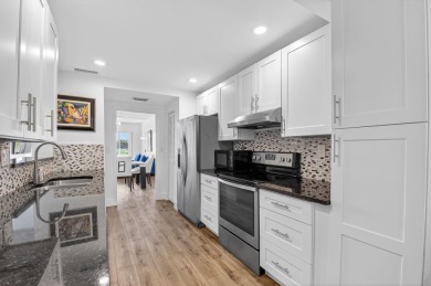 Delray's best kept secret! This beautiful and spacious condo is on Hamlet Country Club in Florida - for sale on GolfHomes.com, golf home, golf lot