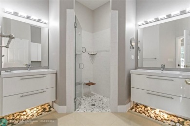 Very rarely available corner villa overlooking a canal and the on Palm-Aire Country Club and Resort - The Oaks in Florida - for sale on GolfHomes.com, golf home, golf lot