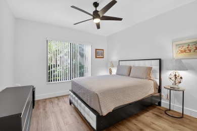 Delray's best kept secret! This beautiful and spacious condo is on Hamlet Country Club in Florida - for sale on GolfHomes.com, golf home, golf lot