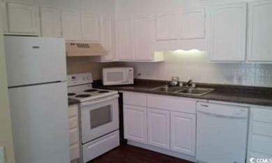 Two Bedroom Second floor unit at Cambridge Place in Garden City on Indian Wells Golf Course in South Carolina - for sale on GolfHomes.com, golf home, golf lot