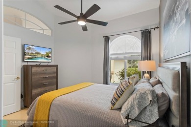 Very rarely available corner villa overlooking a canal and the on Palm-Aire Country Club and Resort - The Oaks in Florida - for sale on GolfHomes.com, golf home, golf lot