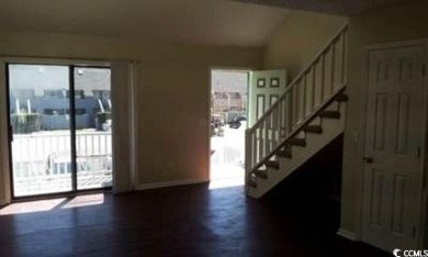 Two Bedroom Second floor unit at Cambridge Place in Garden City on Indian Wells Golf Course in South Carolina - for sale on GolfHomes.com, golf home, golf lot
