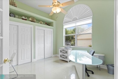 Very rarely available corner villa overlooking a canal and the on Palm-Aire Country Club and Resort - The Oaks in Florida - for sale on GolfHomes.com, golf home, golf lot