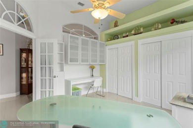 Very rarely available corner villa overlooking a canal and the on Palm-Aire Country Club and Resort - The Oaks in Florida - for sale on GolfHomes.com, golf home, golf lot