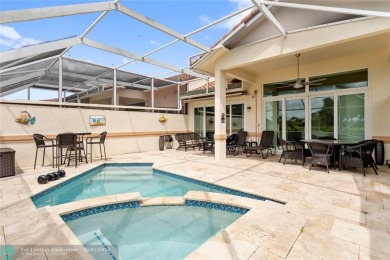 Very rarely available corner villa overlooking a canal and the on Palm-Aire Country Club and Resort - The Oaks in Florida - for sale on GolfHomes.com, golf home, golf lot