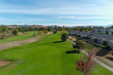 This stunning home in a gated community offers beautiful views on Eagle Point Golf Course in Oregon - for sale on GolfHomes.com, golf home, golf lot