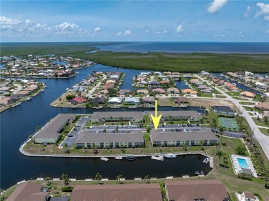 END-UNIT CONDO IN PGI W/UPDATED INTERIOR  DIRECT SAILBOAT ACCESS on Saint Andrews South Golf Club in Florida - for sale on GolfHomes.com, golf home, golf lot