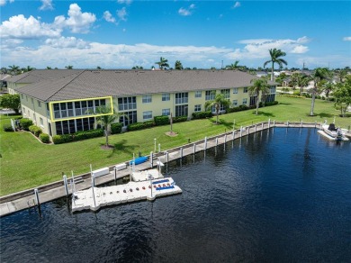 END-UNIT CONDO IN PGI W/UPDATED INTERIOR  DIRECT SAILBOAT ACCESS on Saint Andrews South Golf Club in Florida - for sale on GolfHomes.com, golf home, golf lot