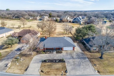 This golf course home has it all! Great location. Immaculate & on Lake Kiowa Golf Course in Texas - for sale on GolfHomes.com, golf home, golf lot