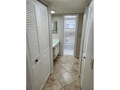 SPACIOUS, CLEAN, TURN-KEY 2ND FLOOR UNIT IN THE WELL-MAINTAINED on Pine Island Ridge Country Club in Florida - for sale on GolfHomes.com, golf home, golf lot