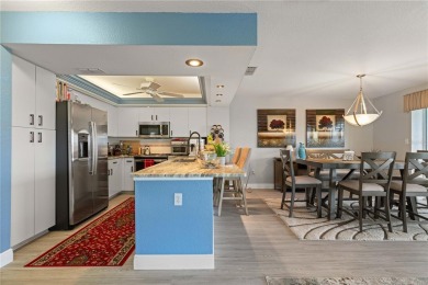 END-UNIT CONDO IN PGI W/UPDATED INTERIOR  DIRECT SAILBOAT ACCESS on Saint Andrews South Golf Club in Florida - for sale on GolfHomes.com, golf home, golf lot