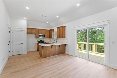 Come see this fantastic new construction home with a one year on Bella Vista Country Club - Kingswood in Arkansas - for sale on GolfHomes.com, golf home, golf lot
