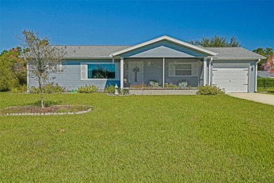 Welcome to this charming and impeccably maintained home located on The Links of Spruce Creek in Florida - for sale on GolfHomes.com, golf home, golf lot