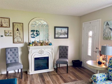 Welcome to this charming and impeccably maintained home located on The Links of Spruce Creek in Florida - for sale on GolfHomes.com, golf home, golf lot