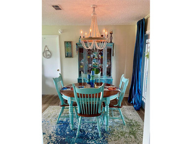 Welcome to this charming and impeccably maintained home located on The Links of Spruce Creek in Florida - for sale on GolfHomes.com, golf home, golf lot