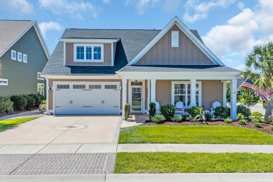 Relax on the welcoming front porch and soak up the sunshine in on Surf Golf and Beach Club in South Carolina - for sale on GolfHomes.com, golf home, golf lot