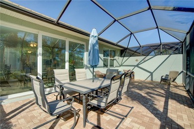 Experience the best of Southwest Florida living in this on Pelican Preserve Golf Club in Florida - for sale on GolfHomes.com, golf home, golf lot
