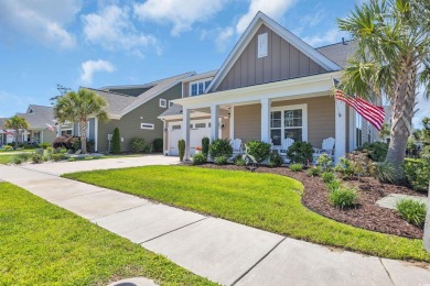Relax on the welcoming front porch and soak up the sunshine in on Surf Golf and Beach Club in South Carolina - for sale on GolfHomes.com, golf home, golf lot