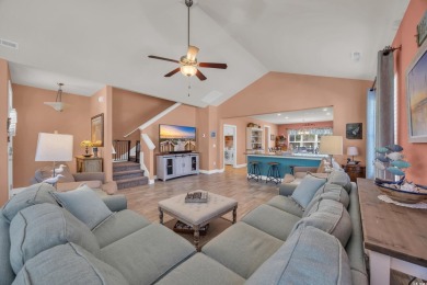 Relax on the welcoming front porch and soak up the sunshine in on Surf Golf and Beach Club in South Carolina - for sale on GolfHomes.com, golf home, golf lot