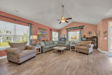 Relax on the welcoming front porch and soak up the sunshine in on Surf Golf and Beach Club in South Carolina - for sale on GolfHomes.com, golf home, golf lot